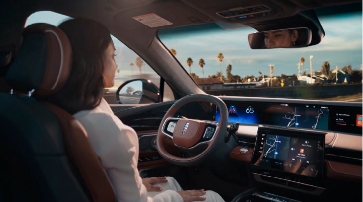 A person is shown driving hands-free on the highway with available Lincoln BlueCruise technology. | Cavalier Lincoln in Chesapeake VA
