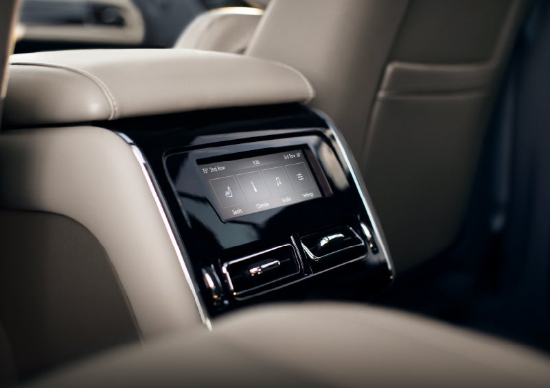 Climate controls on the back of the front row console in a 2022 Lincoln® Aviator