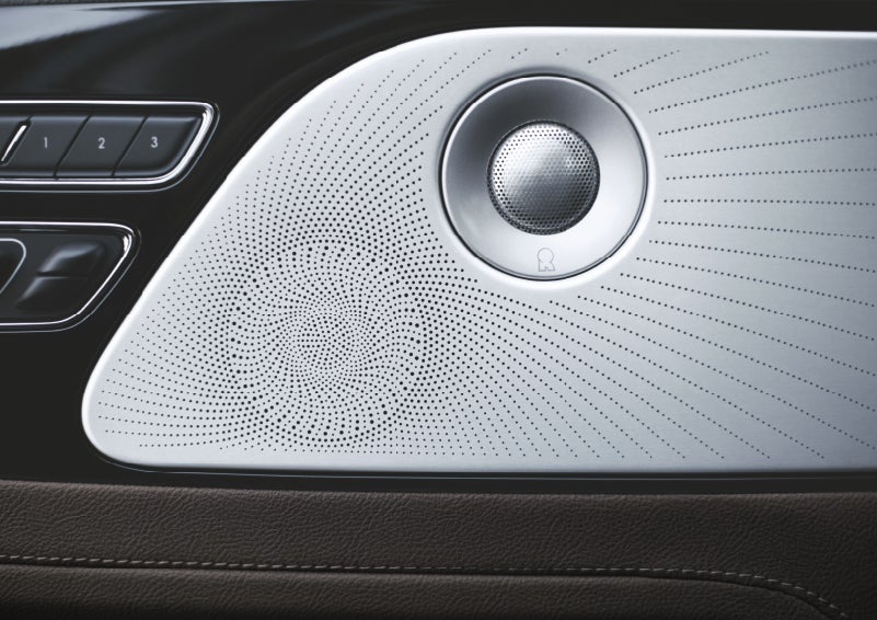 AOne of the 28 speakers in the Revel 3D Audio System in a 2022 Lincoln® Aviator