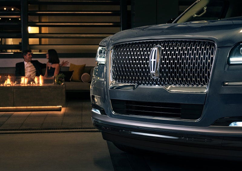 The front grille of a 2023 Lincoln Navigator® SUV is elegantly illuminated. | Cavalier Lincoln in Chesapeake VA