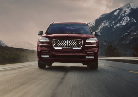 A 2024 Lincoln Aviator® SUV is shown in the Diamond Red exterior color. | Cavalier Lincoln in Chesapeake VA