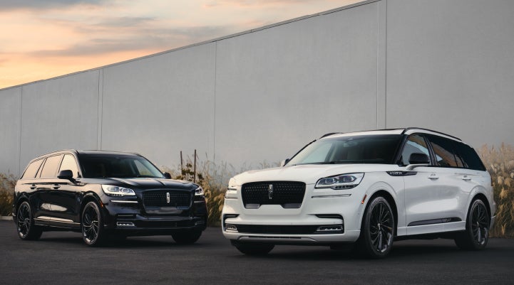 Two Lincoln Aviator® SUVs are shown with the available Jet Appearance Package | Cavalier Lincoln in Chesapeake VA