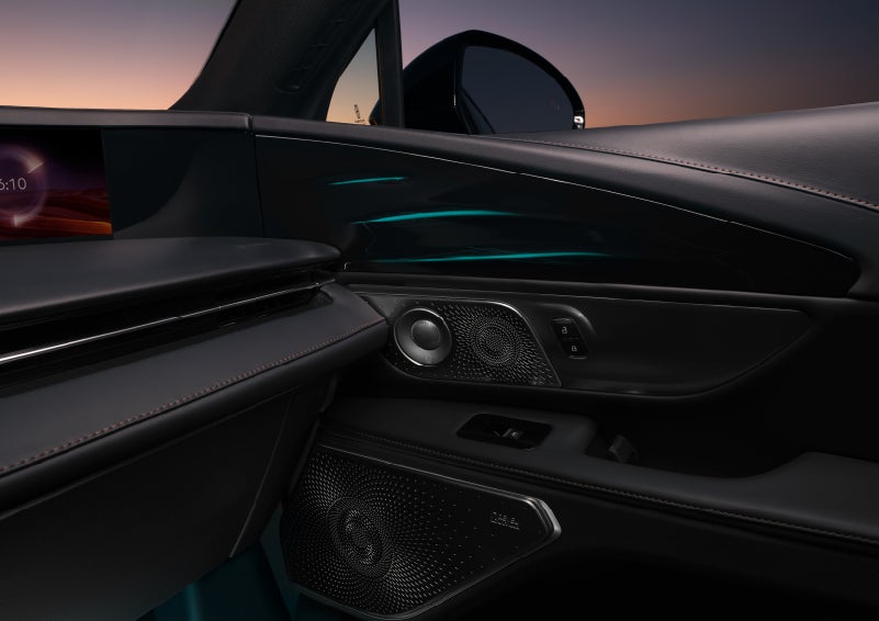 Selectable ambient lighting glows in the passenger door panel. | Cavalier Lincoln in Chesapeake VA