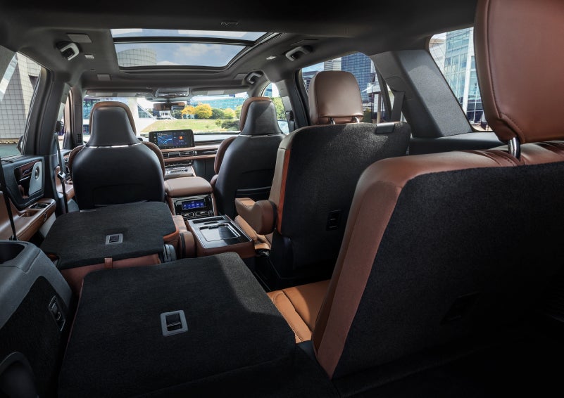 The interior of the 2025 Lincoln Aviator® SUV is shown with two seats folded down for added space. | Cavalier Lincoln in Chesapeake VA