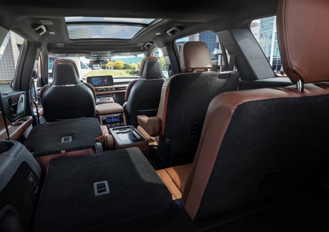 The interior of the 2025 Lincoln Aviator® SUV is shown with two seats folded down for added space. | Cavalier Lincoln in Chesapeake VA