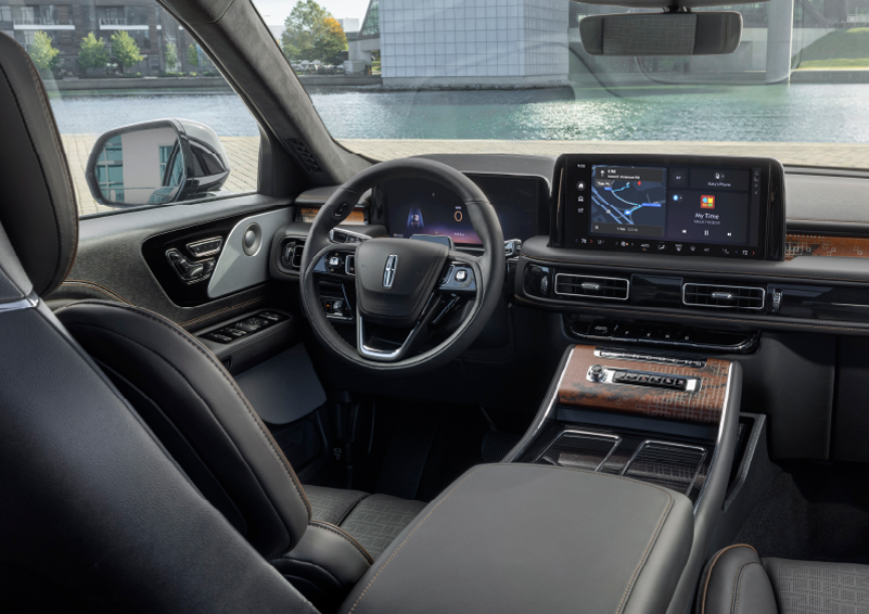 The interior of the 2025 Lincoln Aviator® SUV is shown parked with a view of a harbor through the windshield. | Cavalier Lincoln in Chesapeake VA
