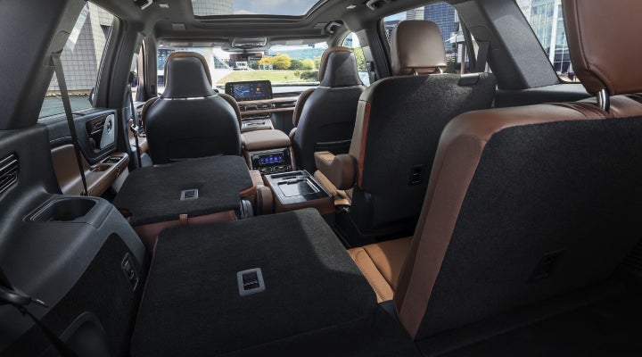 One side of the PowerFold® third-row seat and a second-row seat are folded forward in the 2026 Lincoln Aviator® SUV. | Cavalier Lincoln in Chesapeake VA