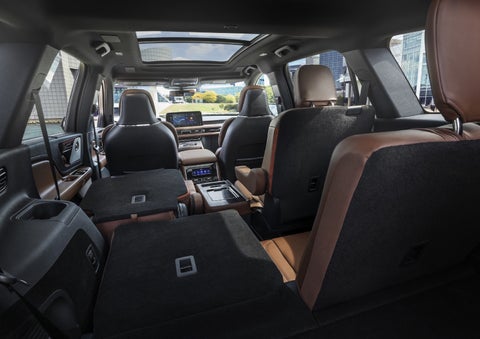 One side of the PowerFold® third-row seat and a second-row seat are folded forward in the 2026 Lincoln Aviator® SUV. | Cavalier Lincoln in Chesapeake VA