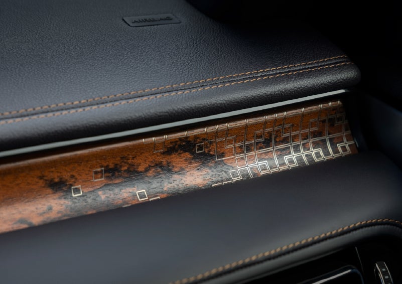 A close-up shot of the 2026 Lincoln Aviator® dashboard with unique black and brown accents and brown stitching. | Cavalier Lincoln in Chesapeake VA