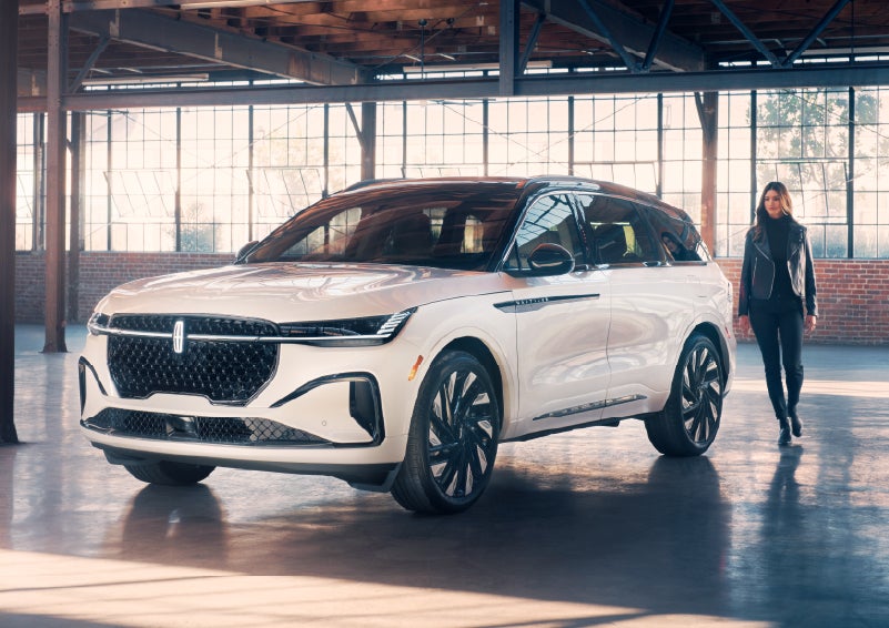 A person approaches a 2026 Lincoln Nautilus® SUV. | Cavalier Lincoln in Chesapeake VA