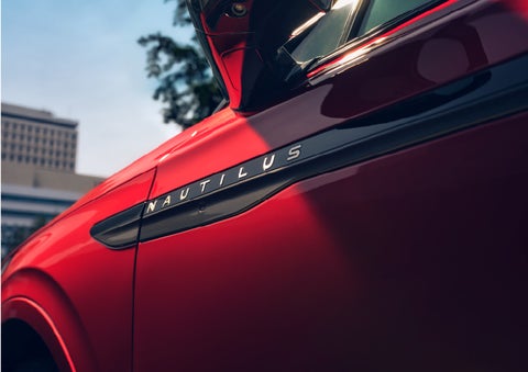 A side badge on the passenger door reads Nautilus. | Cavalier Lincoln in Chesapeake VA