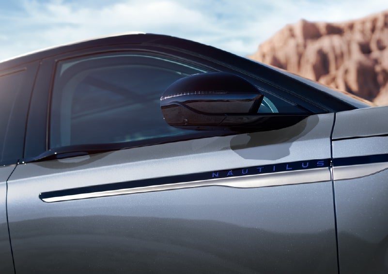 Blue lettering on the side of the vehicle that reads Nautilus indicates the available Hybrid Powertrain. | Cavalier Lincoln in Chesapeake VA