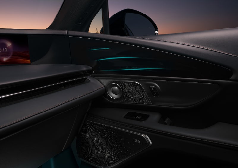 Selectable ambient lighting glows in the passenger door panel. | Cavalier Lincoln in Chesapeake VA